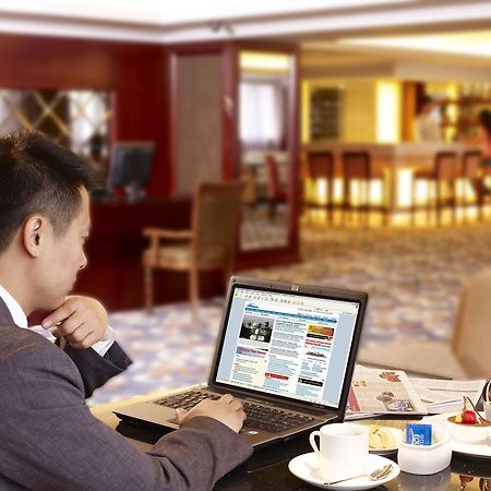Shenyang Rich Gate Hotel Exterior photo